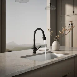 Pull-down kitchen sink faucet with three-function sprayhead