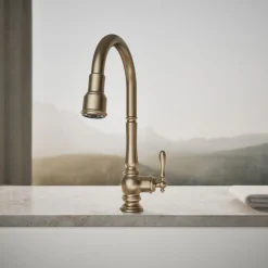 Pull-down kitchen sink faucet with three-function sprayhead