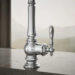Pull-down kitchen sink faucet with three-function sprayhead