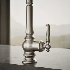 Pull-down kitchen sink faucet with three-function sprayhead