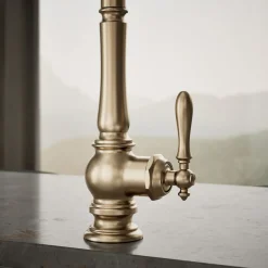 Pull-down kitchen sink faucet with three-function sprayhead