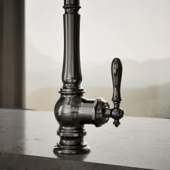 Pull-down kitchen sink faucet with three-function sprayhead