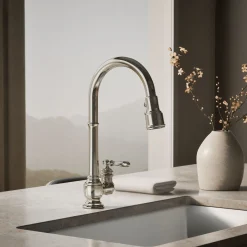 Pull-down kitchen sink faucet with three-function sprayhead