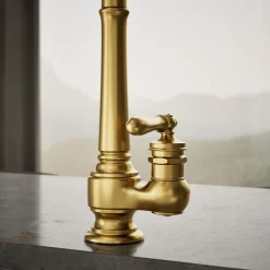 Pull-down kitchen sink faucet with three-function sprayhead