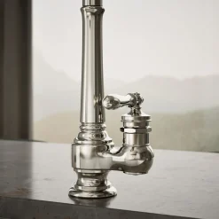 Pull-down kitchen sink faucet with three-function sprayhead