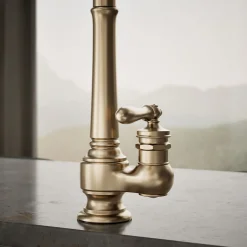 Pull-down kitchen sink faucet with three-function sprayhead