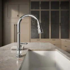 Pull-down kitchen sink faucet with three-function sprayhead