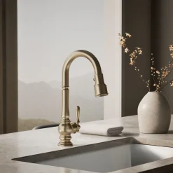 Pull-down kitchen sink faucet with three-function sprayhead