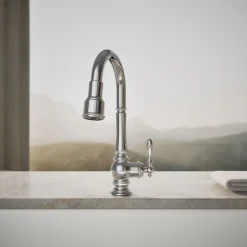 Pull-down kitchen sink faucet with three-function sprayhead