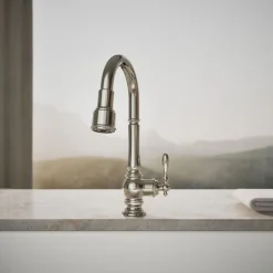 Pull-down kitchen sink faucet with three-function sprayhead