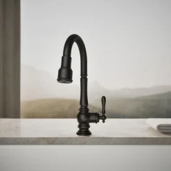 Pull-down kitchen sink faucet with three-function sprayhead