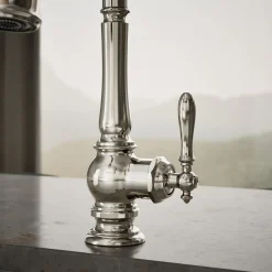 Pull-down kitchen sink faucet with three-function sprayhead
