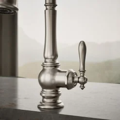 Pull-down kitchen sink faucet with three-function sprayhead