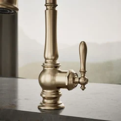 Pull-down kitchen sink faucet with three-function sprayhead
