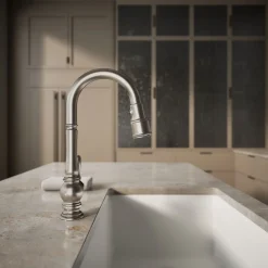 Pull-down kitchen sink faucet with three-function sprayhead