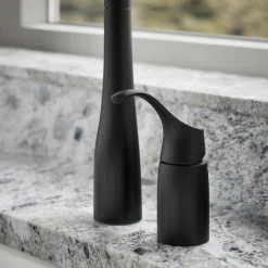 Pull-down kitchen sink faucet with three-function sprayhead