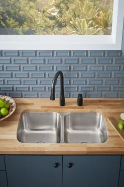 Pull-down kitchen sink faucet with three-function sprayhead