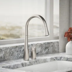 Pull-down kitchen sink faucet with three-function sprayhead