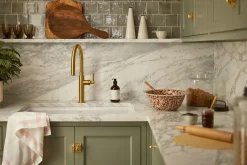 Pull-down kitchen sink faucet with three-function sprayhead