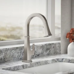 Pull-down kitchen sink faucet with three-function sprayhead
