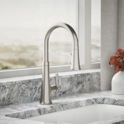 Pull-down kitchen sink faucet with three-function sprayhead