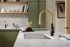 Pull-down kitchen sink faucet with three-function sprayhead