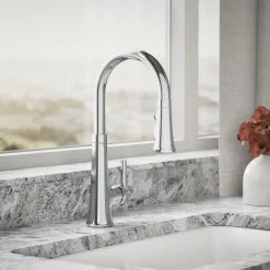 Pull-down kitchen sink faucet with three-function sprayhead