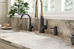 Pull-down kitchen sink faucet with three-function sprayhead