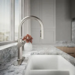 Pull-down kitchen sink faucet with three-function sprayhead