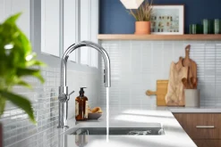 Pull-down kitchen sink faucet with three-function sprayhead