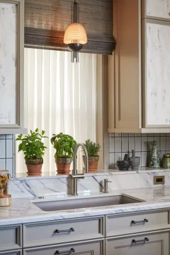 Pull-down kitchen sink faucet with three-function sprayhead