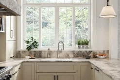 Pull-down kitchen sink faucet with three-function sprayhead