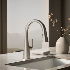 Pull-down kitchen sink faucet with three-function sprayhead