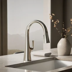 Pull-down kitchen sink faucet with three-function sprayhead