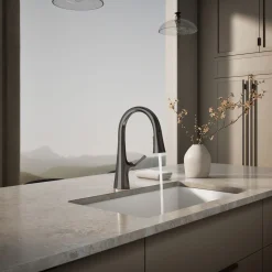 Pull-down kitchen sink faucet with three-function sprayhead