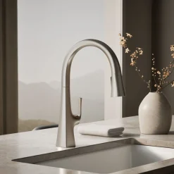 Pull-down kitchen sink faucet with three-function sprayhead