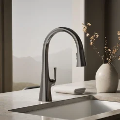 Pull-down kitchen sink faucet with three-function sprayhead
