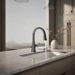 Pull-down kitchen sink faucet with three-function sprayhead
