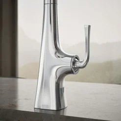Pull-down kitchen sink faucet with three-function sprayhead