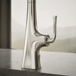 Pull-down kitchen sink faucet with three-function sprayhead
