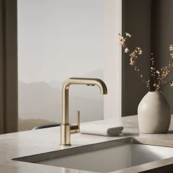 Pull-out kitchen sink faucet with three-function sprayhead