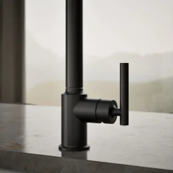 Pull-out kitchen sink faucet with three-function sprayhead