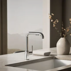 Pull-out kitchen sink faucet with three-function sprayhead