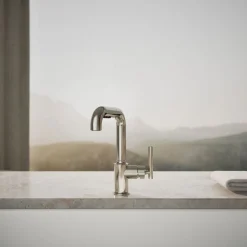 Pull-out kitchen sink faucet with three-function sprayhead