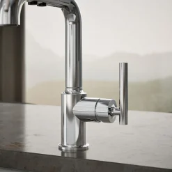 Pull-out kitchen sink faucet with three-function sprayhead