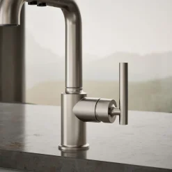 Pull-out kitchen sink faucet with three-function sprayhead