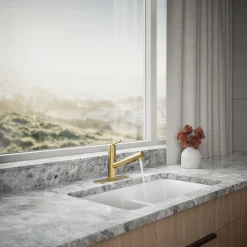 Pull-out kitchen sink faucet with three-function sprayhead