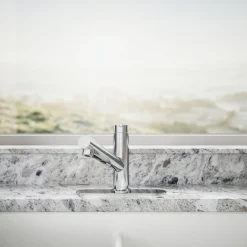 Pull-out kitchen sink faucet with three-function sprayhead