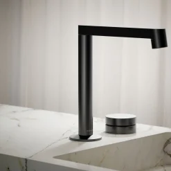 Rocker bathroom sink faucet handle