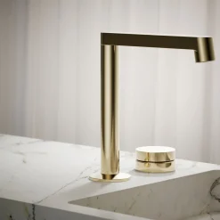 Rocker bathroom sink faucet handle